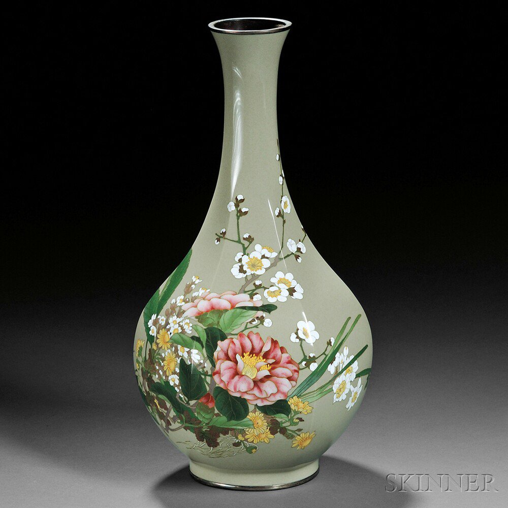 Appraisal: Cloisonne Vase Japan octagonal bottle shape with silver trim decorated