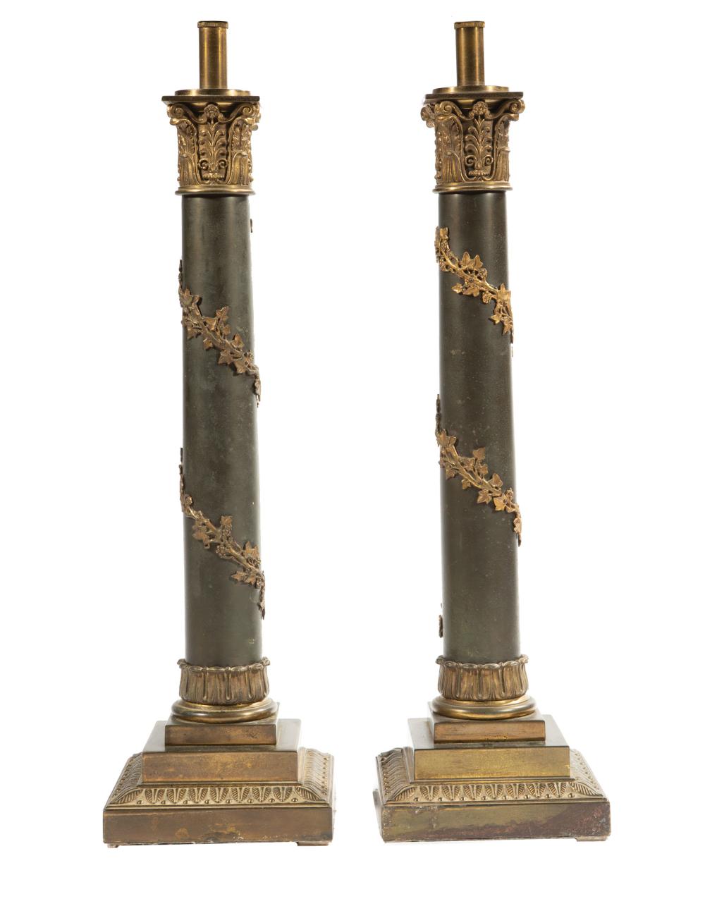 Appraisal: Pair of Continental Patinated and Gilt Metal Columnar Lamps Corinthian