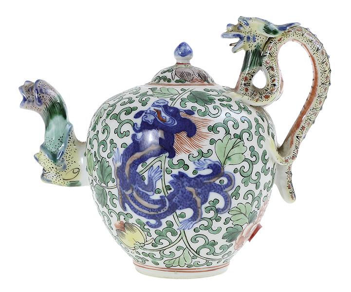 Appraisal: A CHINESE WUCAI ENAMELLED FIGURATIVE PORCELAIN TEAPOT dragon formed spout