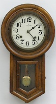 Appraisal: Decorative Regulator Wall Clock Walnut case with glass door gong