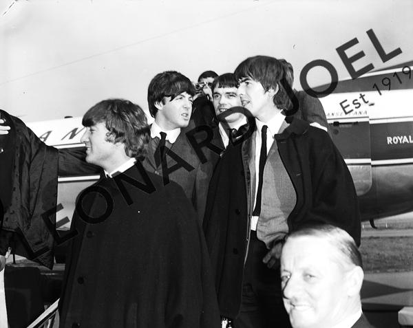 Appraisal: THE BEATLES DISEMBARKING AT ADELAIDE AIRPORT photographer Brian Cotter Australian