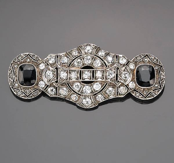 Appraisal: A sapphire and diamond brooch estimated total diamond weight carats