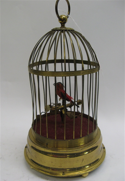 Appraisal: A SWISS MECHANICAL BIRD IN CAGE the a brass plated