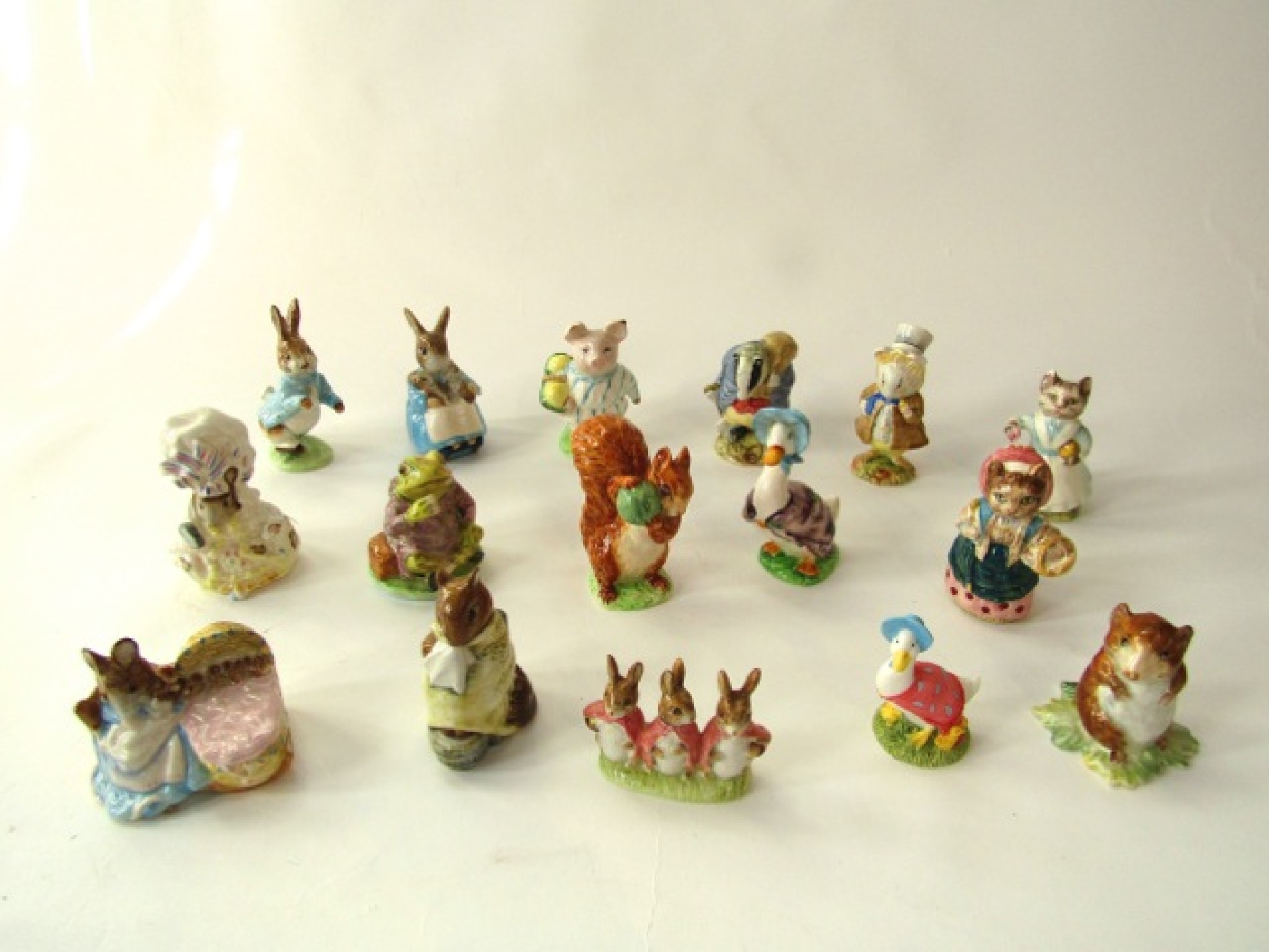 Appraisal: A collection of Beswick Beatrix Potter figures including Chippy Hackee