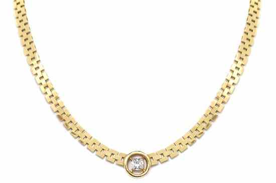 Appraisal: A Karat Yellow Gold and Diamond Necklace containing one round