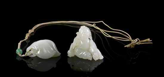 Appraisal: A Group of Two White Jade Toggles depicting a seated