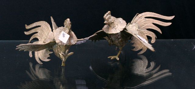 Appraisal: A pair of exotic birds in gilded brass