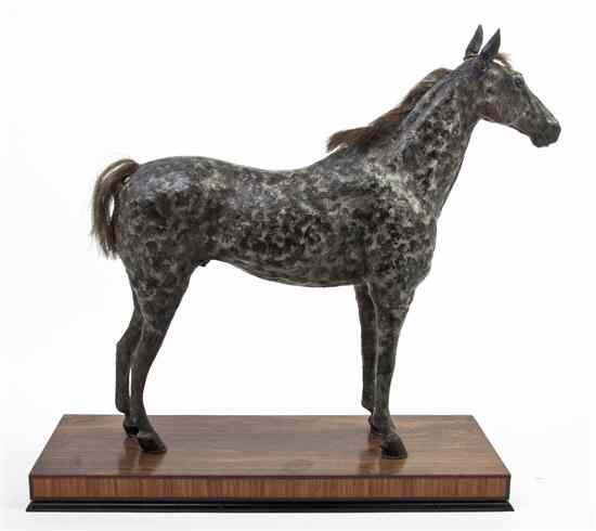 Appraisal: A Carved and Cast Model of a Horse depicted in