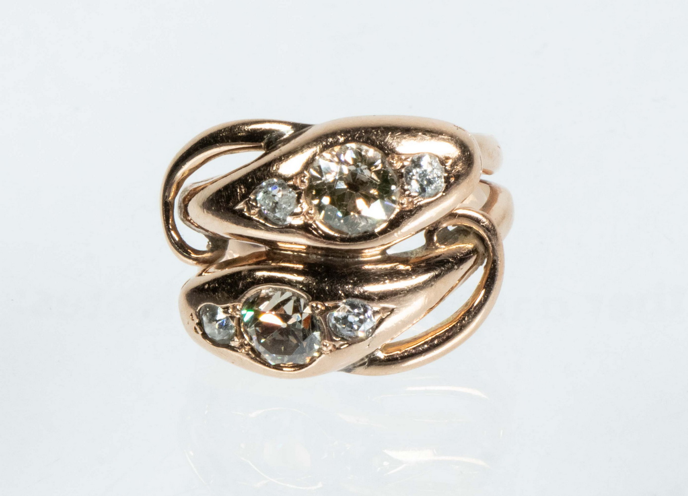 Appraisal: LADIES ANTIQUE K ROSE GOLD AND DIAMOND RING Two serpents