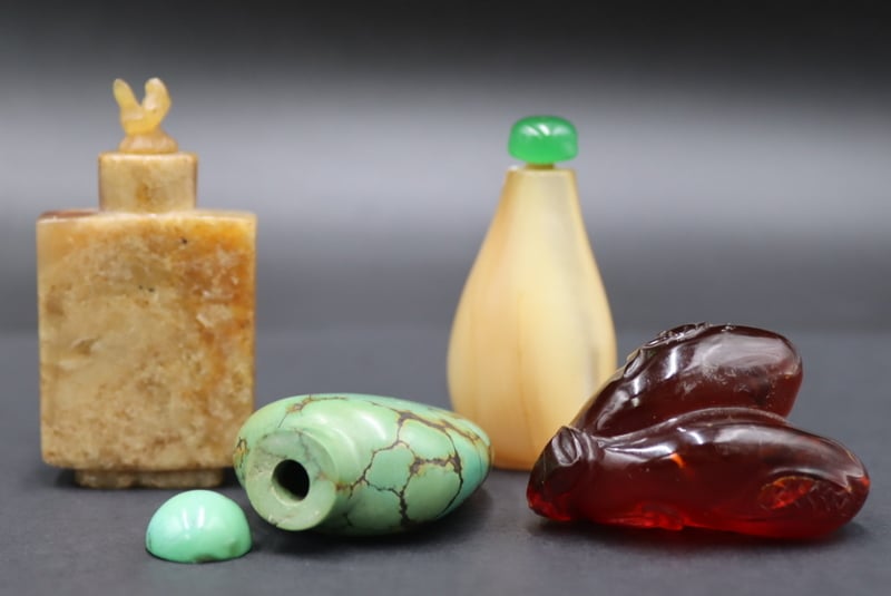 Appraisal: COLLECTION OF CHINESE SNUFF BOTTLES Includes a carved Chinese mother-of-pearl