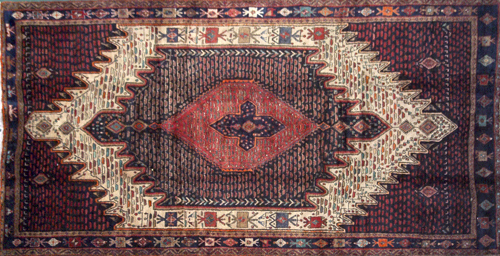 Appraisal: NORTHWEST PERSIAN Rug with red cobalt and ivory-bordered central medallion