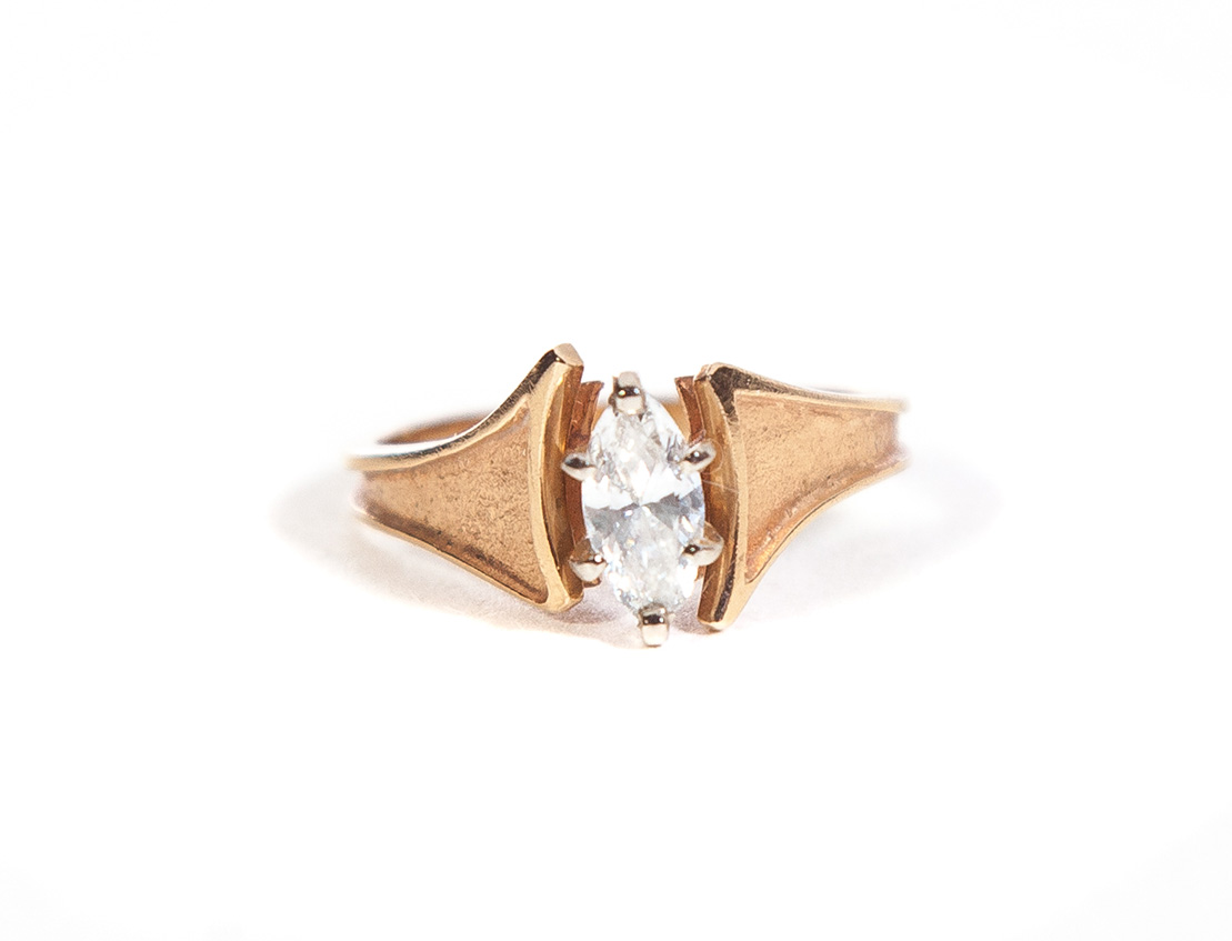 Appraisal: MARQUISE DIAMOND SOLITAIRE RING American late th century Stamped KP