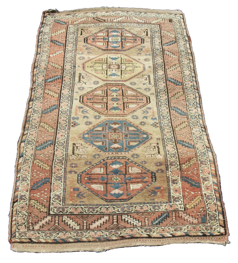 Appraisal: KAZAK RUG A column of five octagons in gold brown