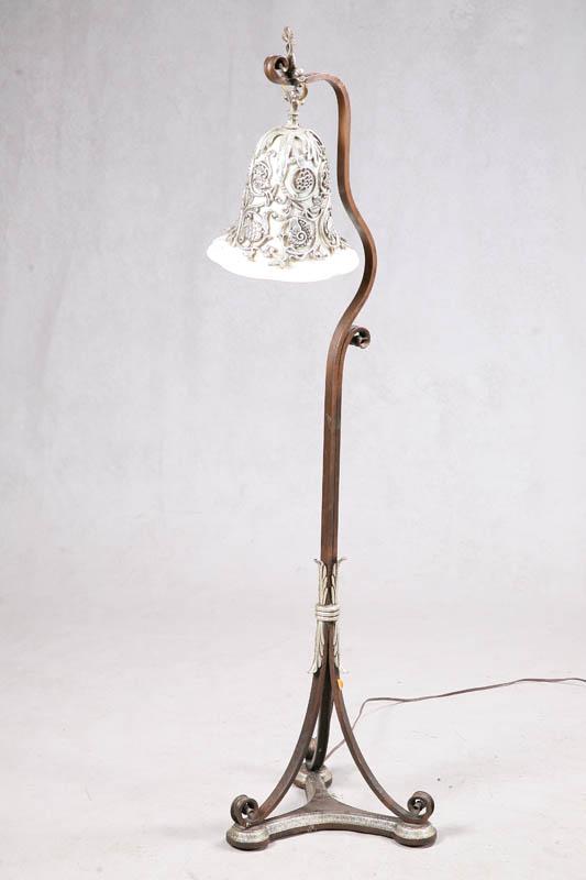 Appraisal: METAL FLOOR LAMP Tri foot base with a wrought iron