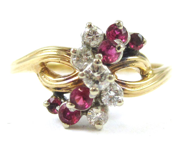 Appraisal: GARNET DIAMOND AND FOURTEEN KARAT GOLD RING set with six