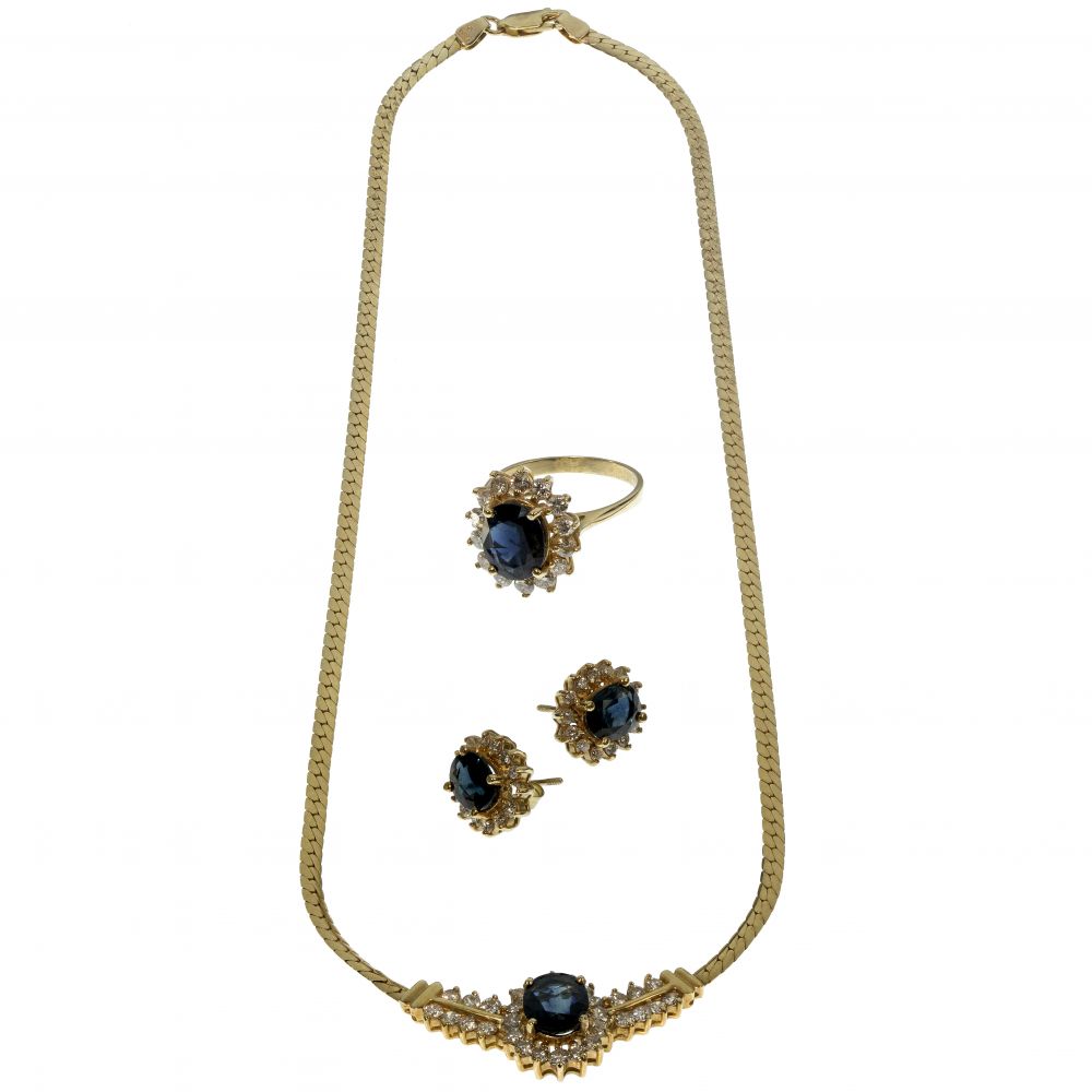 Appraisal: K YELLOW GOLD SAPPHIRE AND DIAMOND JEWELRY SUITE items including