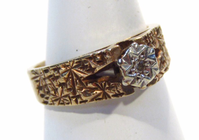 Appraisal: A ladies ct gold solitaire ring the textured part pierced