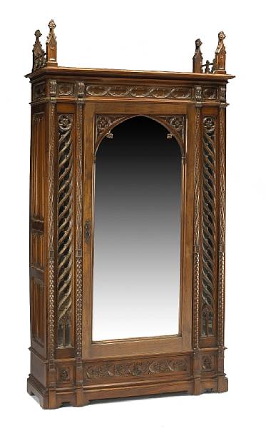 Appraisal: A French Gothic style walnut armoire late th century The