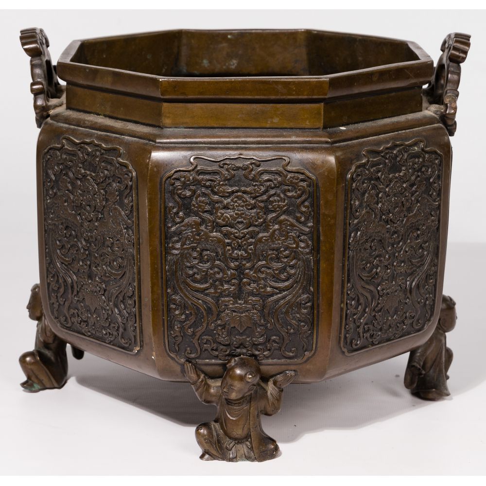 Appraisal: CHINESE BRONZE FOOTED PLANTERHaving octagonal shape having handles and supported