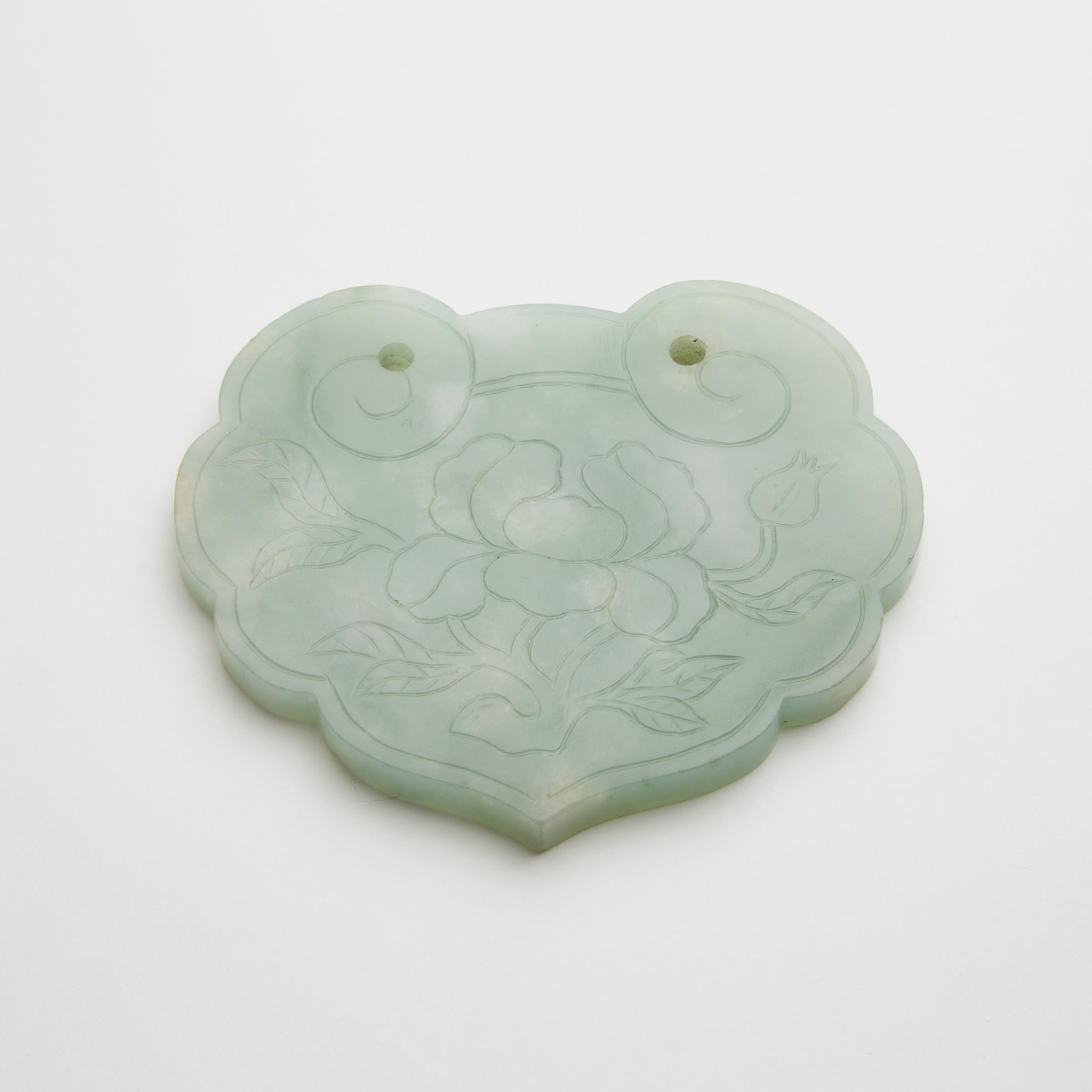 Appraisal: A Carved Jadeite 'Fortune and Longevity' Ruyi Lock-Shaped Pendant th