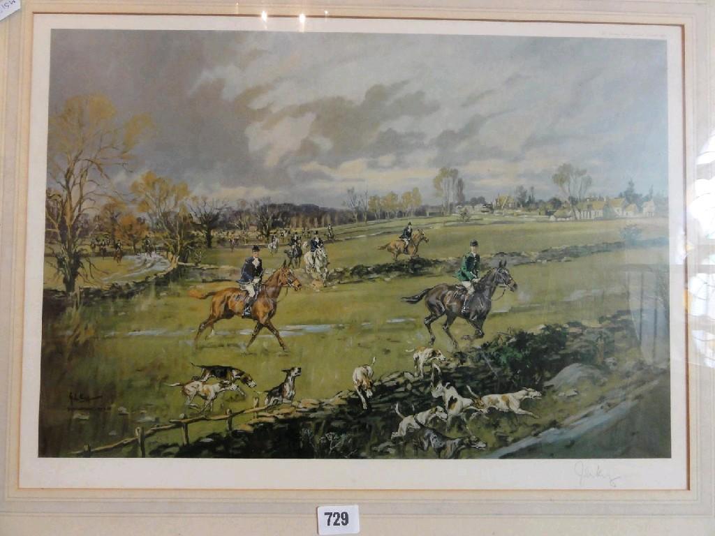 Appraisal: A signed coloured print of a hunting scene with printed