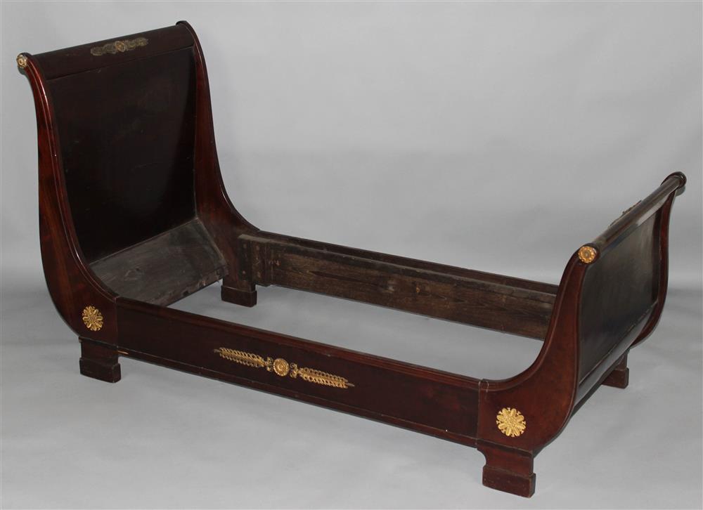 Appraisal: EMPIRE MAHOGANY SINGLE SLEIGH BED or Child's bed Lit a