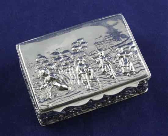 Appraisal: A George V repousse silver rectangular snuff box the lid