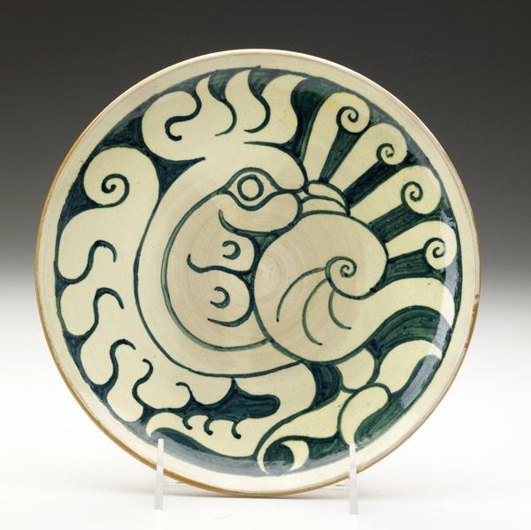 Appraisal: WALTER I ANDERSONSHEARWATERPlate decorated with a stylized peacockProvenance Gift from