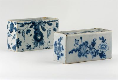 Appraisal: Two Delftware blue and white flower bricks one painted with