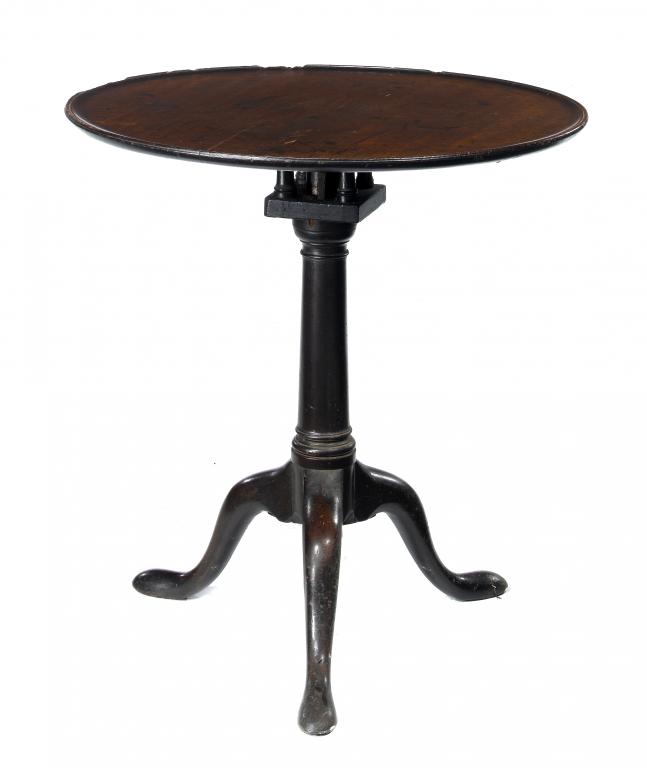 Appraisal: A GEORGE III MAHOGANY TRIPOD TABLE the dished circular top