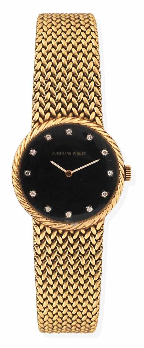 Appraisal: A LADIES AUDEMARS PIGUET GOLD WRISTWATCH Manual wind movement circular