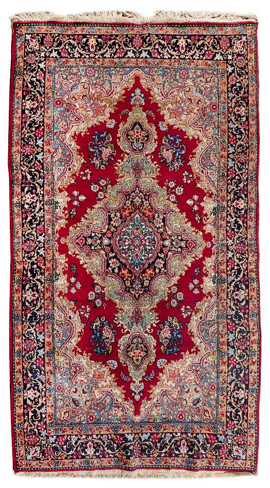 Appraisal: A Kirman Wool Rug feet inches x feet inches A