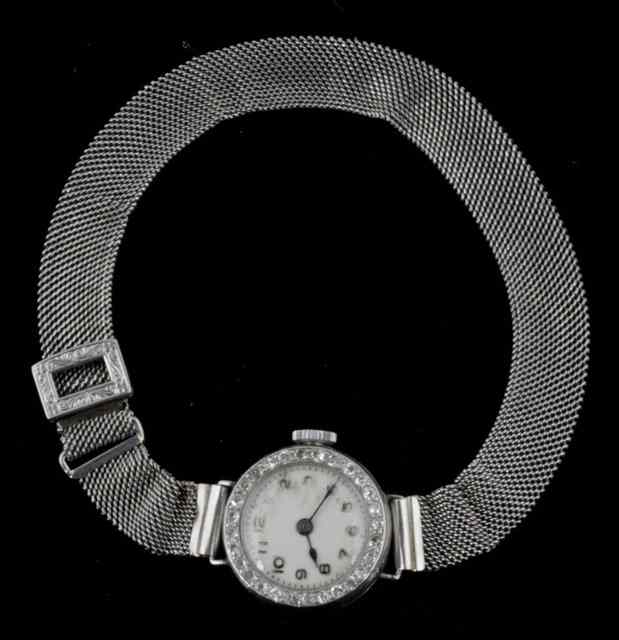 Appraisal: A lady's cocktail watch the diamond bezel to a circular