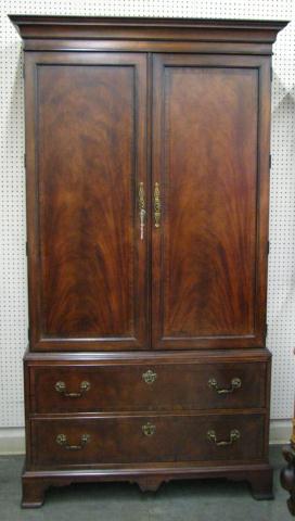 Appraisal: Henredon entertainment armoire classic style with crotch-cut mahogany veneer double-hinged