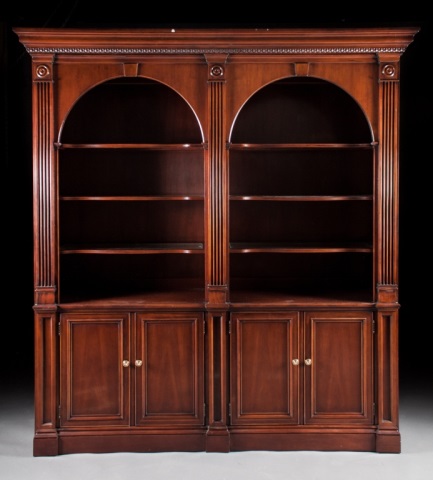 Appraisal: Georgian style mahogany double curio cabinet each side with arch-shaped