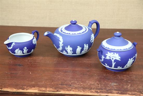 Appraisal: THREE PIECE WEDGWOOD TEASET Blue jasperware with white classical scenes