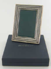 Appraisal: A modern Italian silver photo frame by Gianmaria Buccellati chased