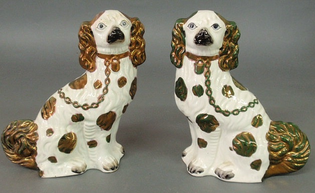 Appraisal: Two Staffordshire seated spaniels th c h