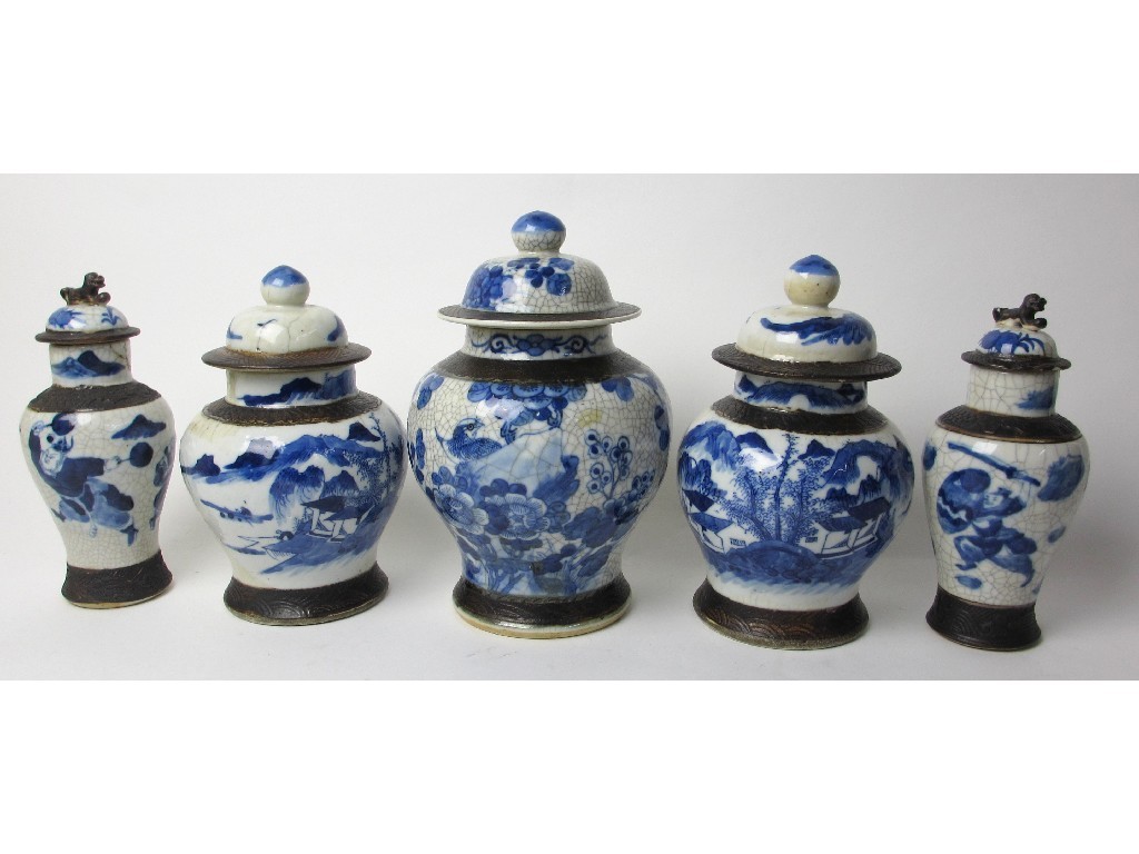 Appraisal: Five Chinese crackled glaze vases and covers painted with figures