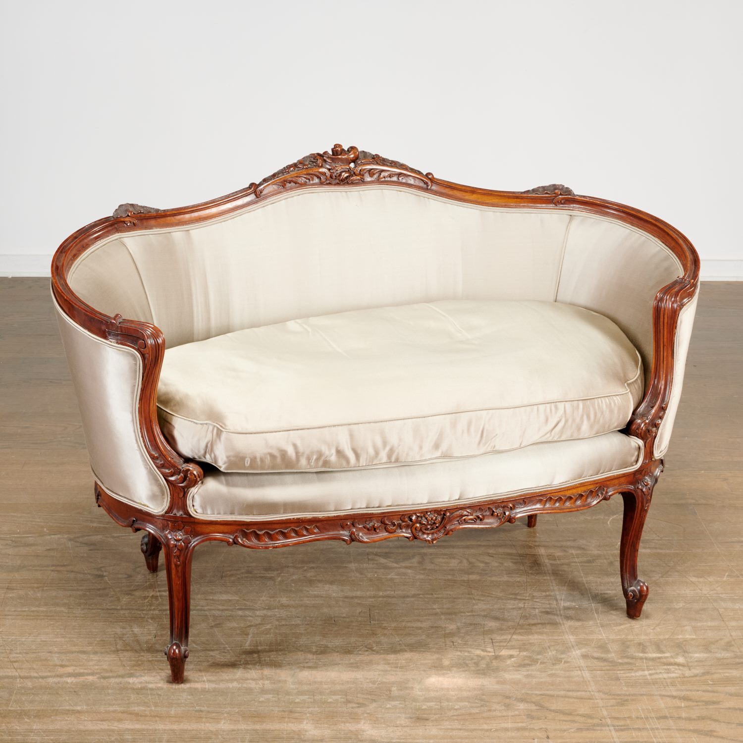 Appraisal: LOUIS XV STYLE SILK UPHOLSTERED WALNUT SETTEE th th c