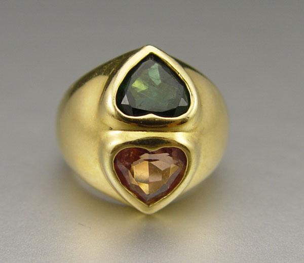 Appraisal: K TOURMALINE RING K yellow gold ring contains two hear