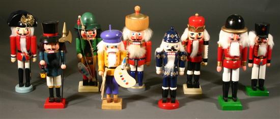 Appraisal: Group of nine modern nutcrackers Including an artist a soldiers