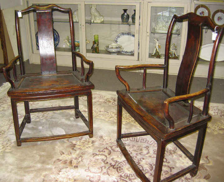 Appraisal: PAIR OF CHINESE YOKE-CREST ARMCHAIRS Each with a serpentine solid