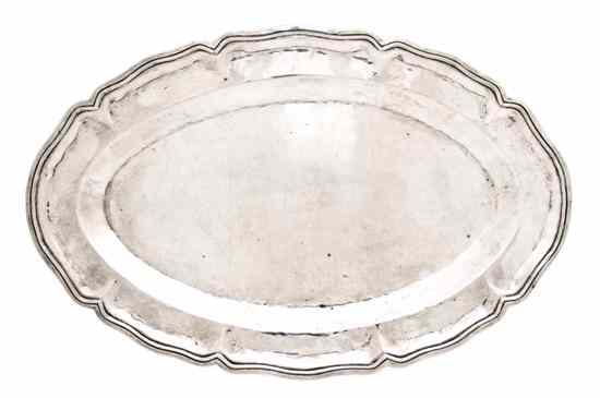 Appraisal: A Peruvian Silver Platter of oval ribbed form stamped approximate