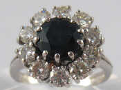 Appraisal: An carat gold sapphire and diamond ring sapphire approx mm