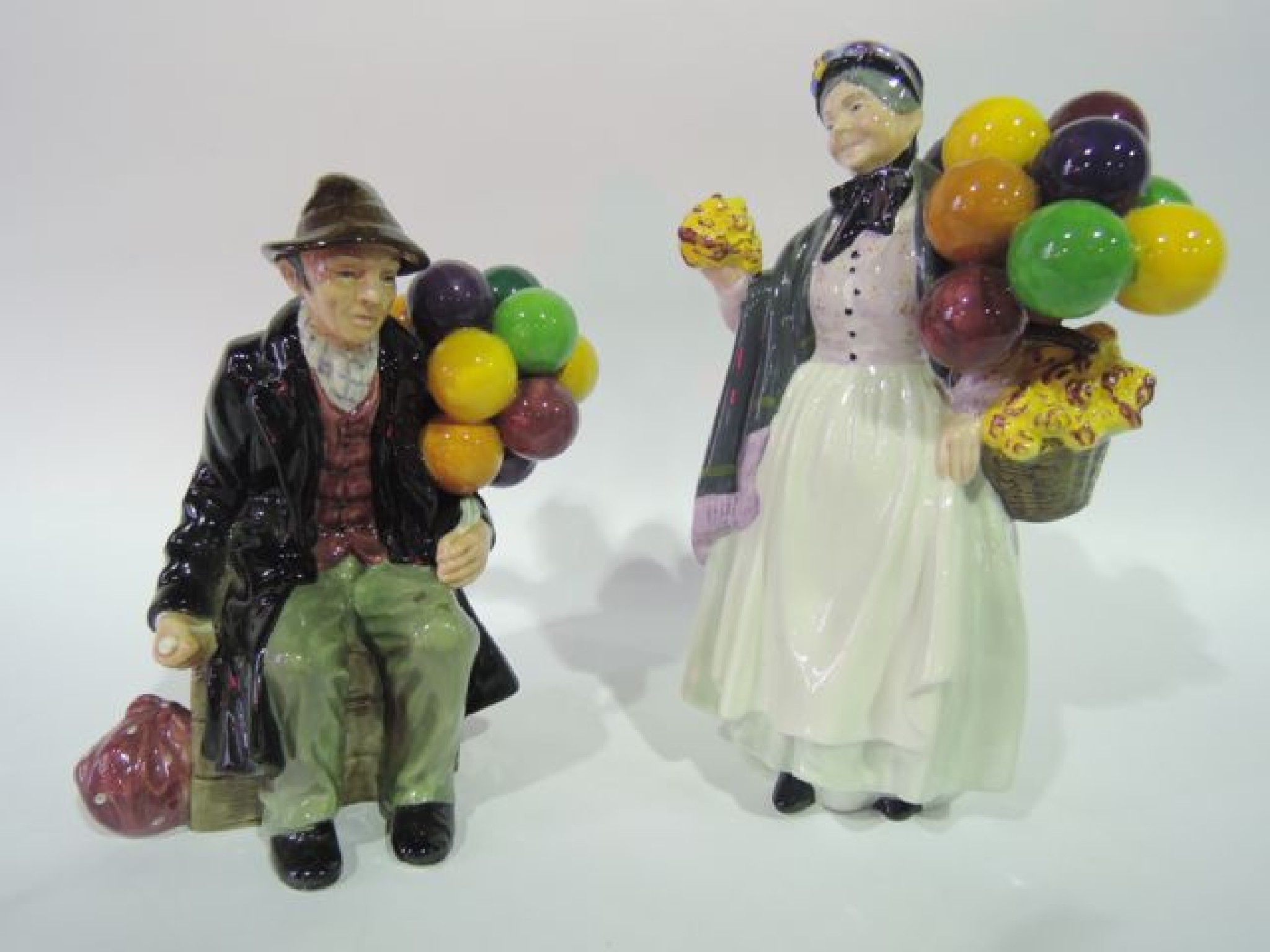 Appraisal: Two Royal Doulton figures of Biddy Penny Farthing HN and