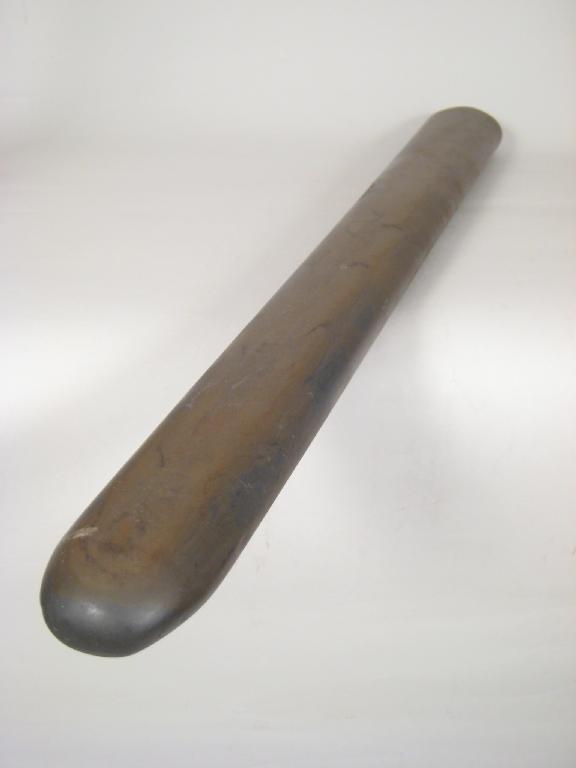 Appraisal: A South Pacific possibly Maori metal stone Club or Pestle