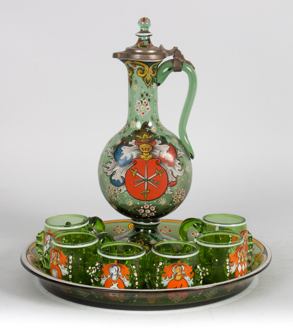 Appraisal: German enameled emerald green glass cordial set early th century