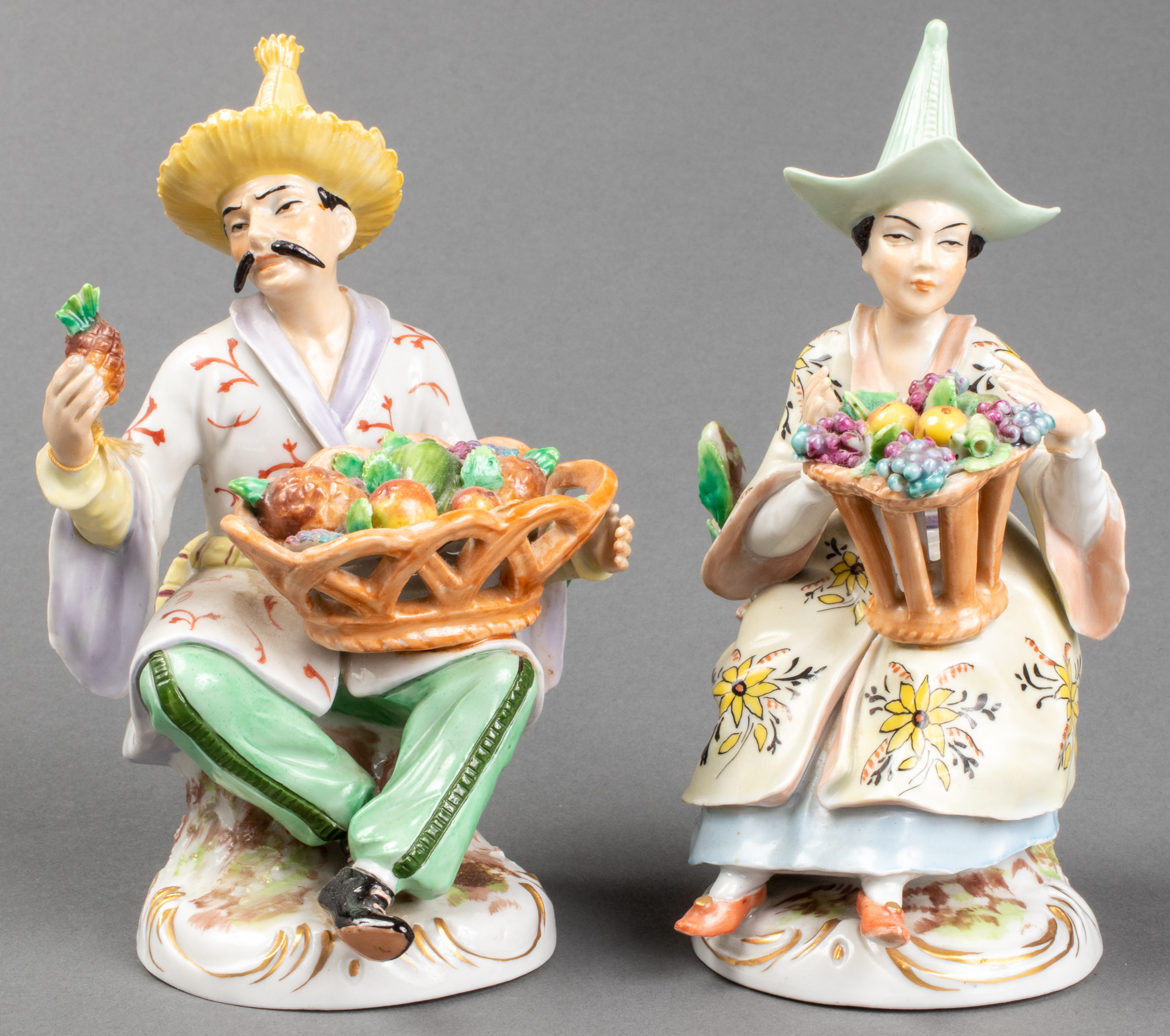 Appraisal: SITZENDORF PORCELAIN CHINOISERIE FIGURES PAIR Pair of German Sitzendorf paint