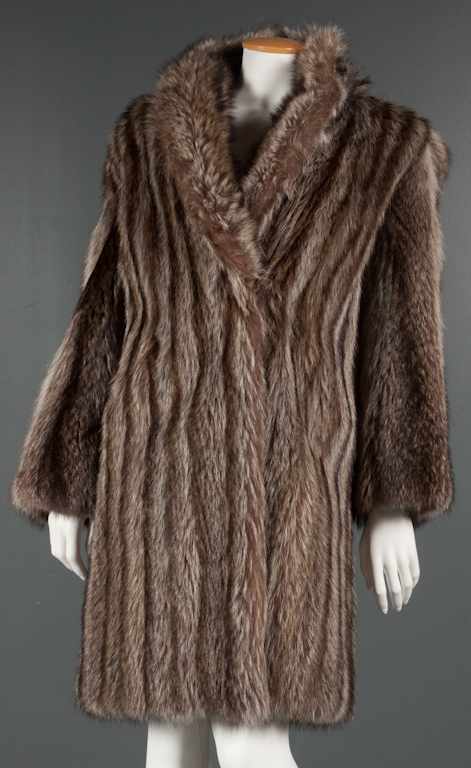 Appraisal: Lady's knee length fur coat possibly raccoon approximately size small